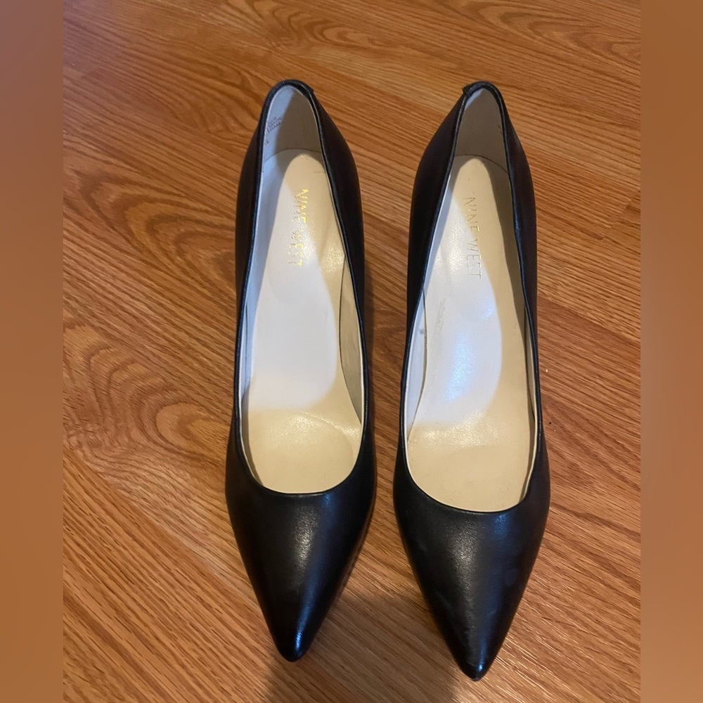 Worn once, black Nine West closed toe pumps